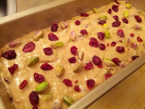 Place in loaf pan, sprinkle with nuts and fruits and bake