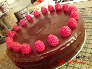 Chocolate Chiffon Cake filled with Chocolate Buttercream and covered with Chocolate Ganache and topped with Raspberries