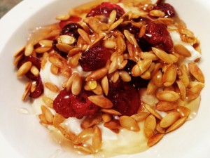 Greek Yogurt topped with Honey, Cranberries and Tasted Melon Seeds