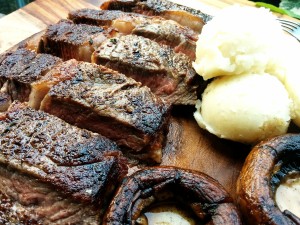 Ribeye Steak with Mashed Potatoes and Grilled Mushrooms
