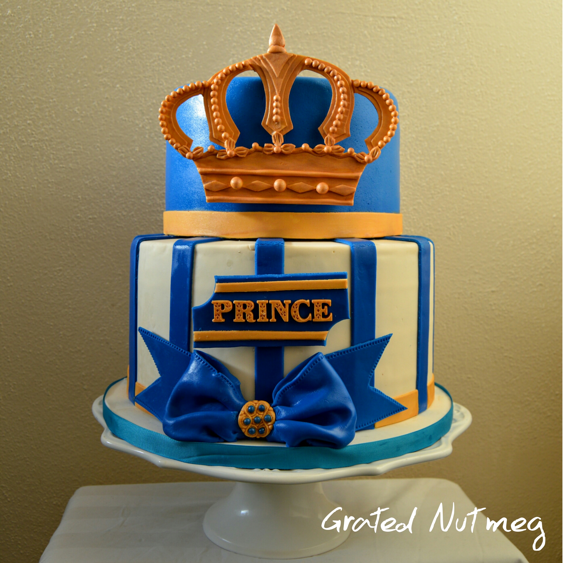 The Making of a Gold and Royal Blue Prince Cake